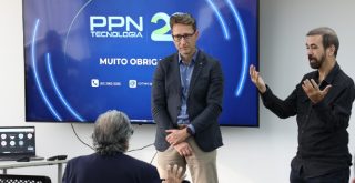 Alberto Campos e Lineu com representante da Salesforce