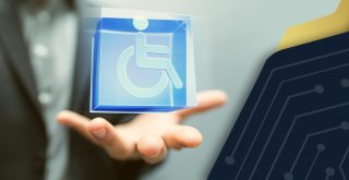 imagem traz uma mão segurando um ícone representando acessibilidade